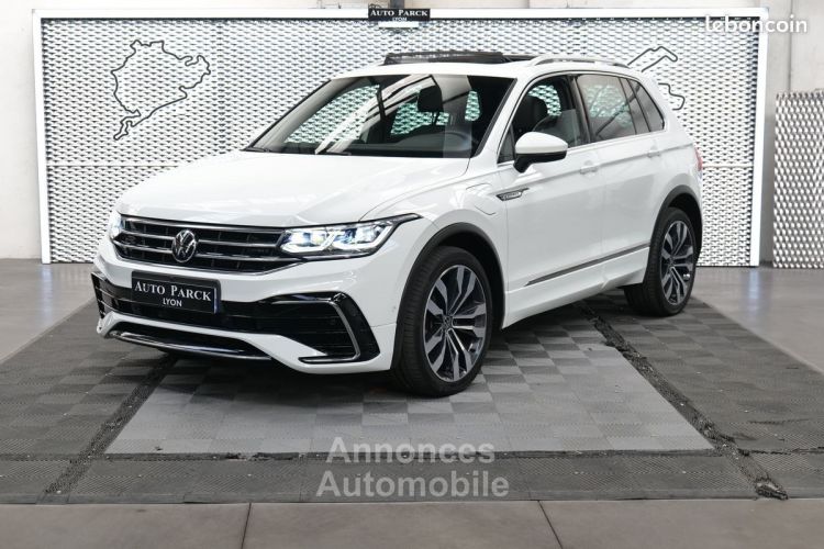 Volkswagen Tiguan NEW eHYBRID 245CH R-LINE EXCLUSIVE DSG 1°MAIN FRANCAIS TVA RECUPERABLE pack ja20 attelage xenon gps virtual cockpit key less go TOIT PANORAMQUE CAMERA - <small></small> 39.950 € <small>TTC</small> - #1