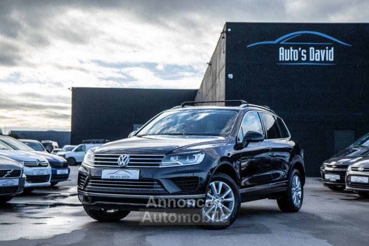 Volkswagen Touareg Volkswagen 3.0 TDi V6 DSG 4Motion - HISTORIEK - XENON - TREKHAAK - ZETELVERWARMING - PANO DAK - EURO 6b - <small></small> 19.999 € <small>TTC</small> - #1