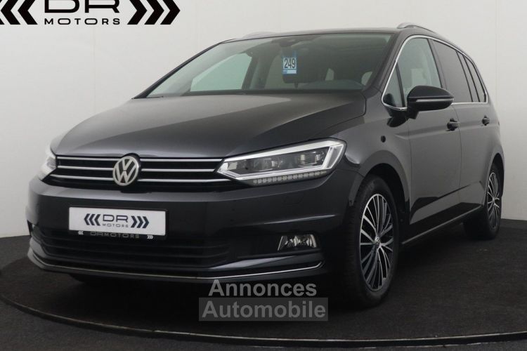 Volkswagen Touran 1.6TDI HIGHLINE DSG - 7 PLAATSEN NAVI LEDER PANODAK - <small></small> 21.995 € <small>TTC</small> - #1