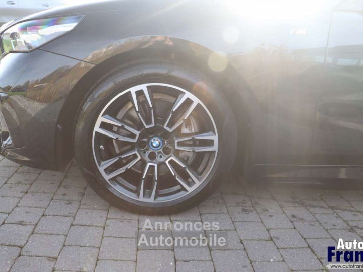 BMW i5 40 M-SPORT TREKHK H&K CAM STUURVRW 19 - 4