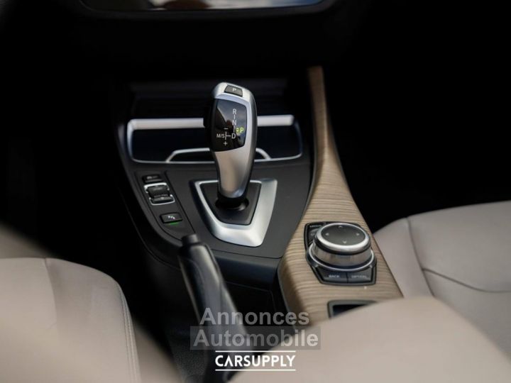 BMW Série 2 218 218iA automaat - GPS - PDC - Luxury Line - leder - 18