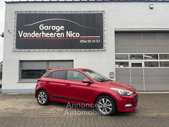 Hyundai i20 1.2i Pop 5d. AIRCO,CRUISE,PDC,BLUETH,SERVO,ALU - 1