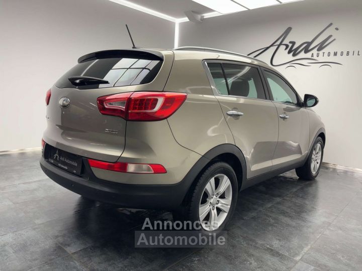 Kia Sportage 1.7 CRDi 2WD TOIT OUV SIEGE CHAUFF AV+AR 1ER PROP - 4