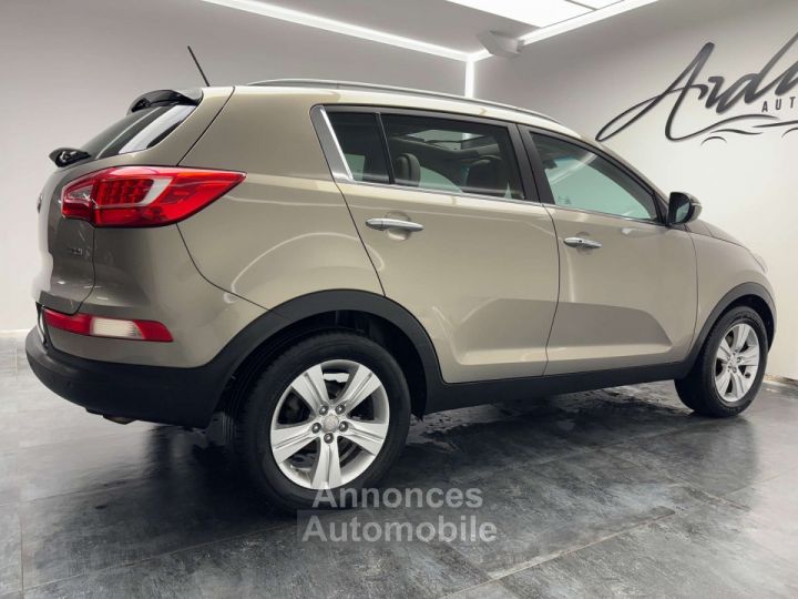 Kia Sportage 1.7 CRDi 2WD TOIT OUV SIEGE CHAUFF AV+AR 1ER PROP - 16