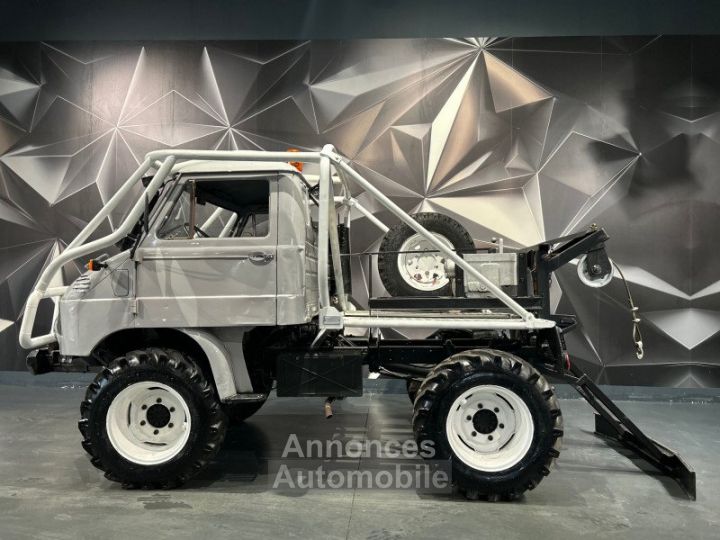 Mercedes Unimog 411 35 CH - 11