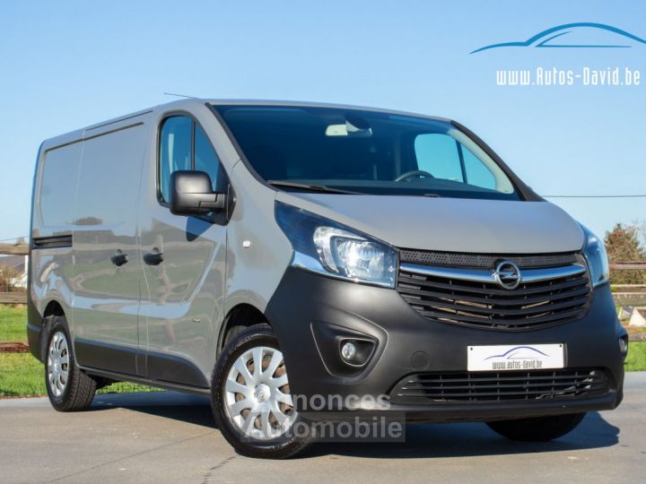 Opel Vivaro 1.6 DTCi L2H1 - 3 ZITPLAATSEN - 1 EIGENAAR - PARKEERCAMERA - AIRCO - CRUISECONTROL - TREKHAAK - EURO 6 - 1