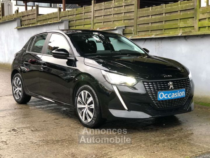 Peugeot 208 1.2i PureTech Style( clim pdc Appel CarPlay ect) - 1