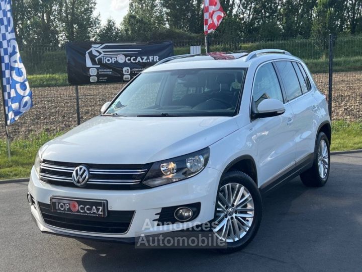 Volkswagen Tiguan 2.0 TDI 110CH BLUEMOTION CUP TOIT OUVRANT/ GPS/ 04/2014 - 1