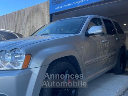 Annonce Jeep Grand Cherokee Jeep Grand Cherokee 6.1 HEMI V8 SRT8 A GAR 1 AN t