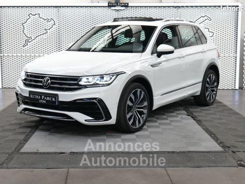 Annonce Volkswagen Tiguan NEW eHYBRID 245CH R-LINE EXCLUSIVE DSG 1°MAIN FRANCAIS TVA RECUPERABLE pack ja20 attelage xenon gps virtual cockpit key less go TOIT PANORAMQUE CAMERA