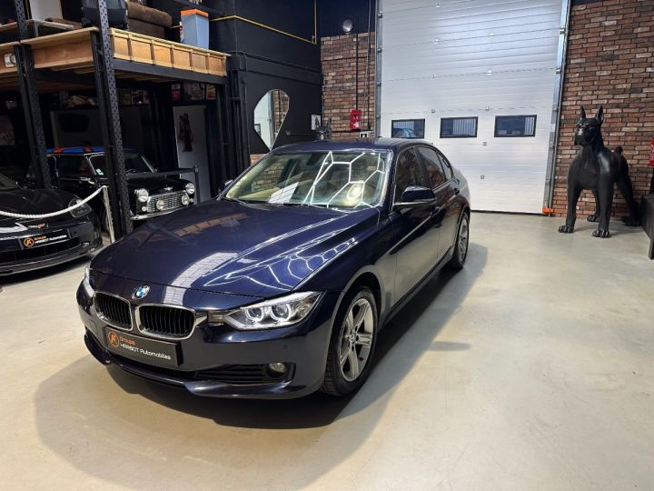 BMW Série 3 SERIE F30 320d 184 ch 117 g Lounge A Bleu - 1