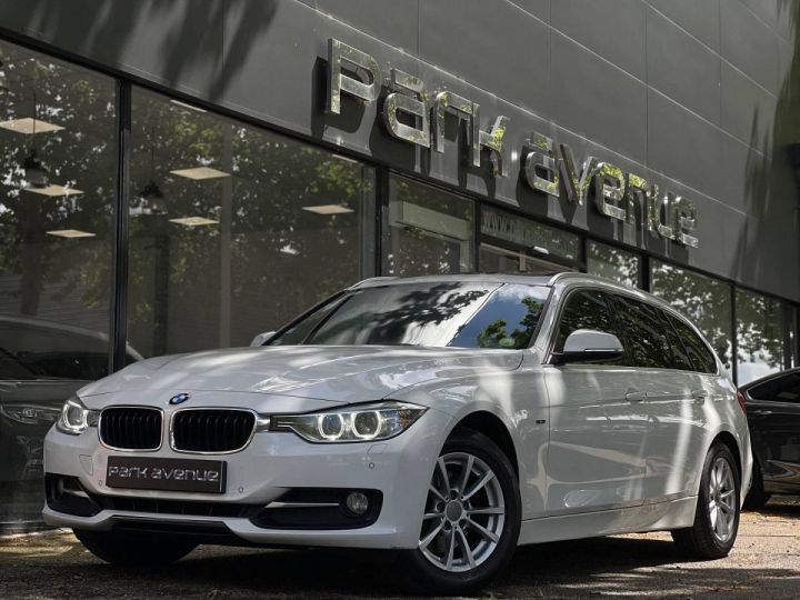 BMW Série 3 Touring SERIE (F31) 320DA 184CH SPORT Blanc - 1