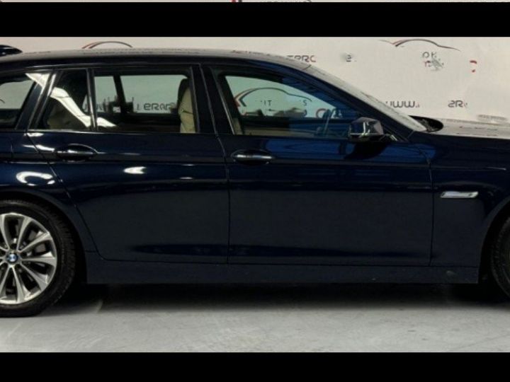 BMW Série 5 Touring 530 d xDrive 258  BVA8 luxe 06/2016 bleu métal - 11