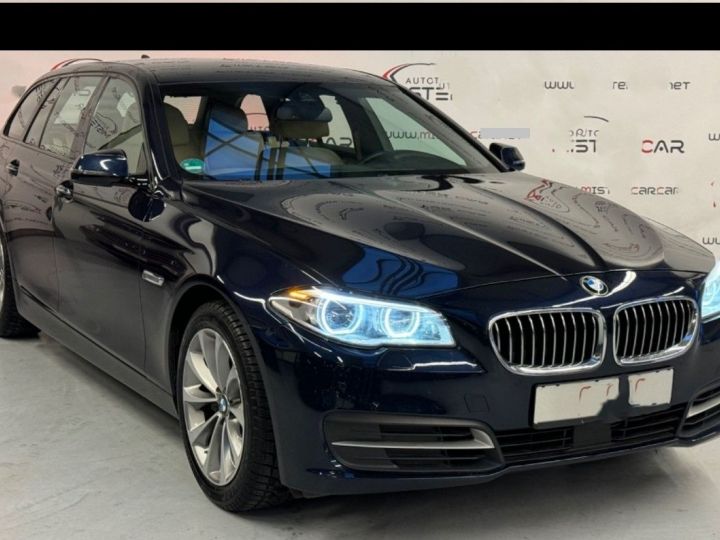 BMW Série 5 Touring 530 d xDrive 258  BVA8 luxe 06/2016 bleu métal - 12
