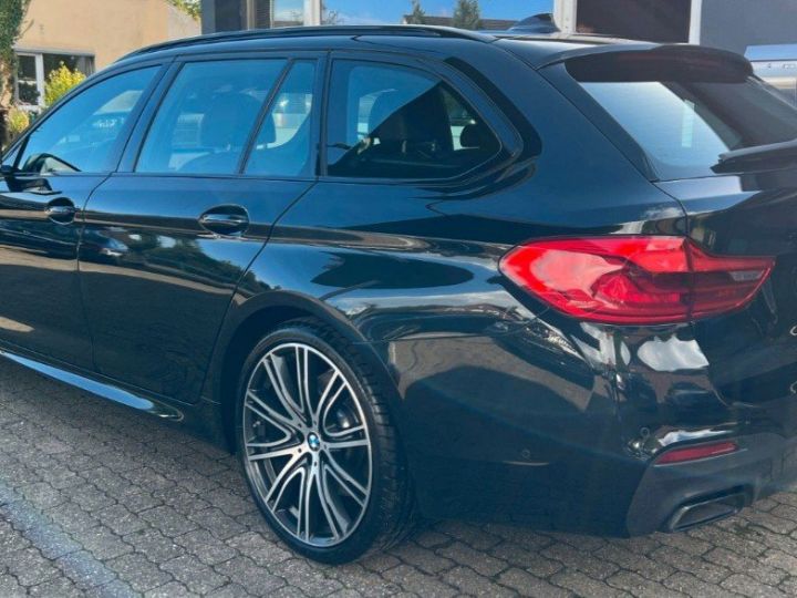 BMW Série 5 Touring  G31 3.0 M550DA 400 12/2018 noir métal - 13