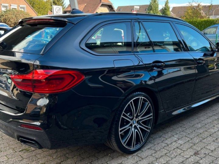 BMW Série 5 Touring  G31 3.0 M550DA 400 12/2018 noir métal - 14