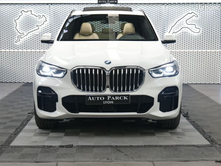 BMW X5 G05 XDRIVE 45e 394ch BVA8 M SPORT 1ERE MAIN FRANCAIS VIRTUAL CACKPIT TOIT OUVRANT PANO CAMERA 360° ECLAIRAGE AMBIANCE KEY LESS GO JA20 PARK ASSIST PLU Blanc - 2