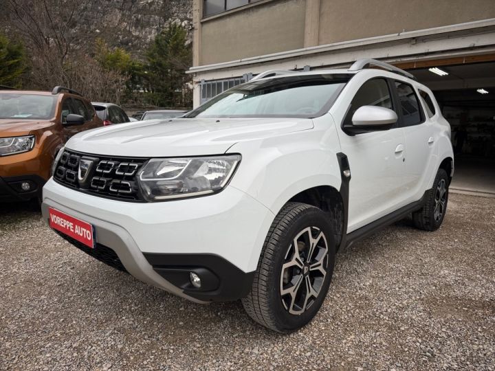 Dacia Duster 1.3 TCE 130CH FAP PRESTIGE 4X2/1 ERE MAIN / CREDIT / CRITAIR 1 / Blanc - 1