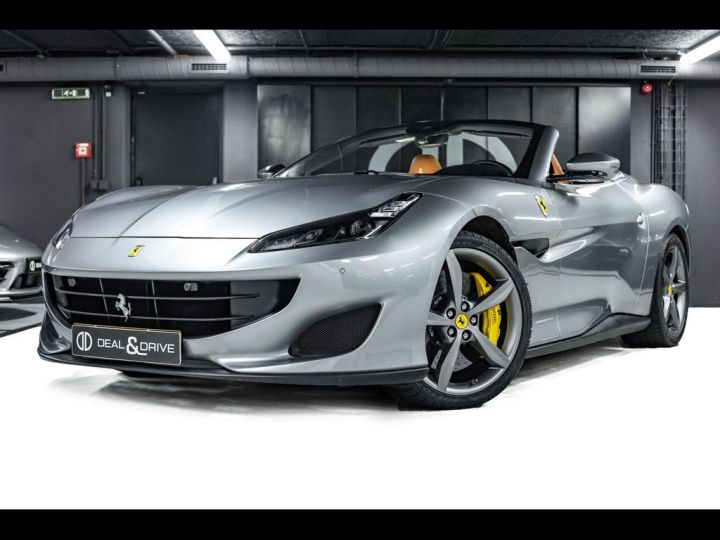 Ferrari Portofino V8 3.9 600 ch DAYTONA 4P °MAGNERIDE° Son JBL°Caméra ° 1èreM ° entretien Ferrari de 7 ans jusqu'au 14/08/2026 ° Garantie Prémium 12 mois Grise - 1