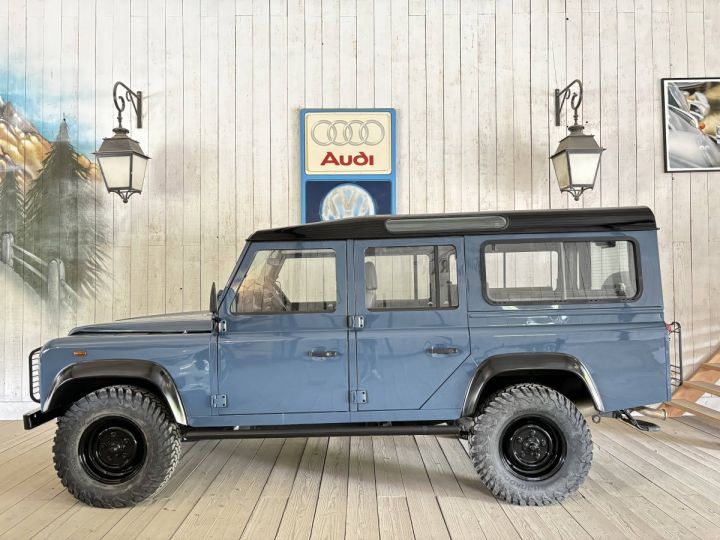 Land Rover Defender TD5 110 SW 9PL TVA Bleu - 1