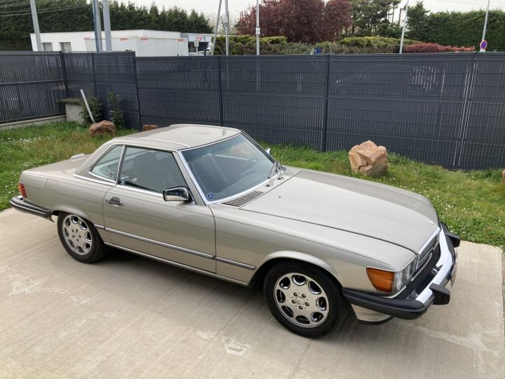 Mercedes 560 MERCEDES- BENZ SL 560 ( R107 )  BEIGE METALLISE - 14