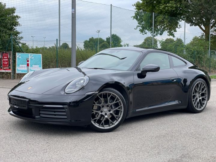 Porsche 992  (911) Carrera *Caméra 360°*RS Spyder*PackCuir*DAB+*Sièges Sport Plus*Carplay*Garantie NOIR - 1