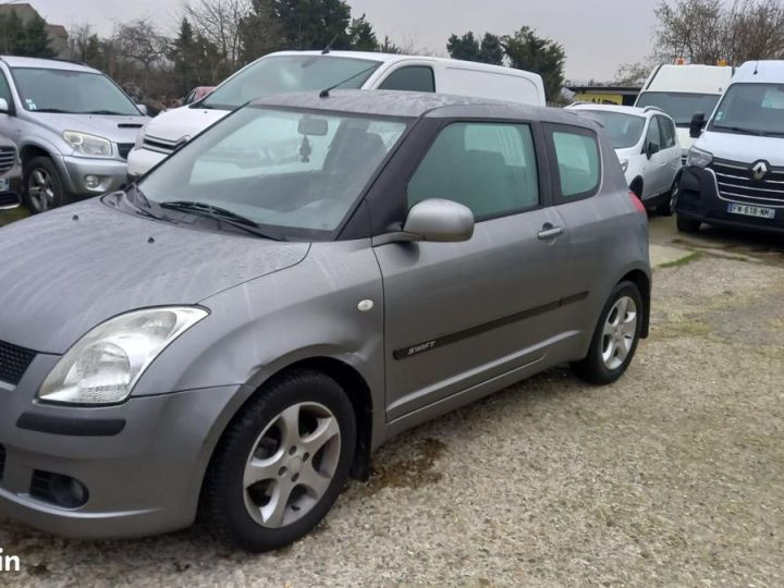 Suzuki Swift 1.3 VVT 92 GLX BVR Gris - 1