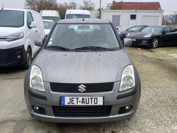 Suzuki Swift 1.3 VVT 92 GLX BVR Gris - 2