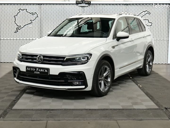 Volkswagen Tiguan 2.0 tdi 190 r line dsg7 4motion 1°main francais tva recuperable gps bi xenon toit ouvrant camera 360 key less go dcc acc detecteur ligne blanche angle Blanc - 1