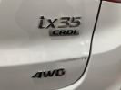 Hyundai ix35 2.0 CRDi 136 4WD Pack Premium +TOIT OUVRANT+CAMERA Blanc  - 21