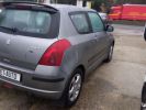 Suzuki Swift 1.3 VVT 92 GLX BVR Gris  - 13