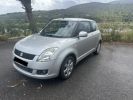 Suzuki Swift 1.3 VVT GLX BMR 3P Gris C  - 1