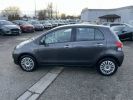 Toyota Yaris II 1.4 90ch D-4D 5Portes 5Places Clim GRIS  - 9